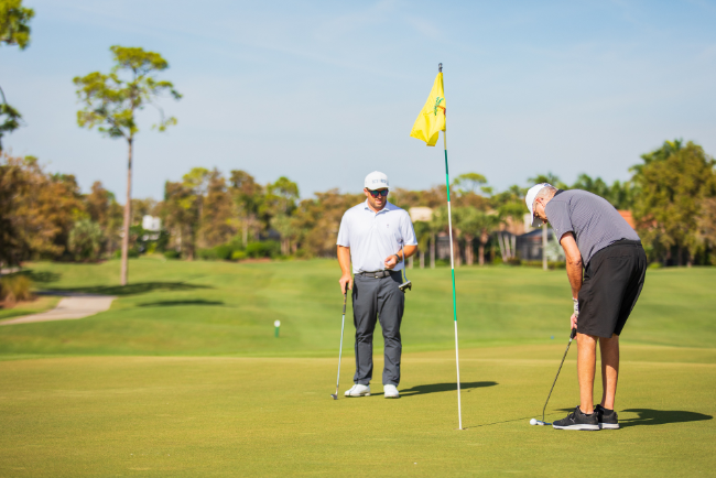 Golf Course View: Scenic view of the golf course at Olde Cypress, perfect for kicking off your New Year golf goals.Olde Cypress.