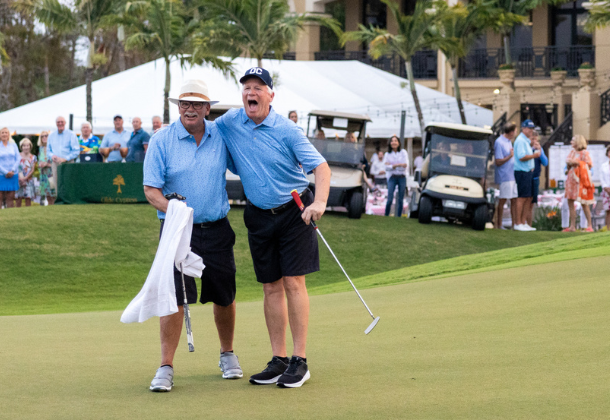 Ed Boutet and Peter Presperin holding trophies at The Men's Tradition tournament in February 2024.